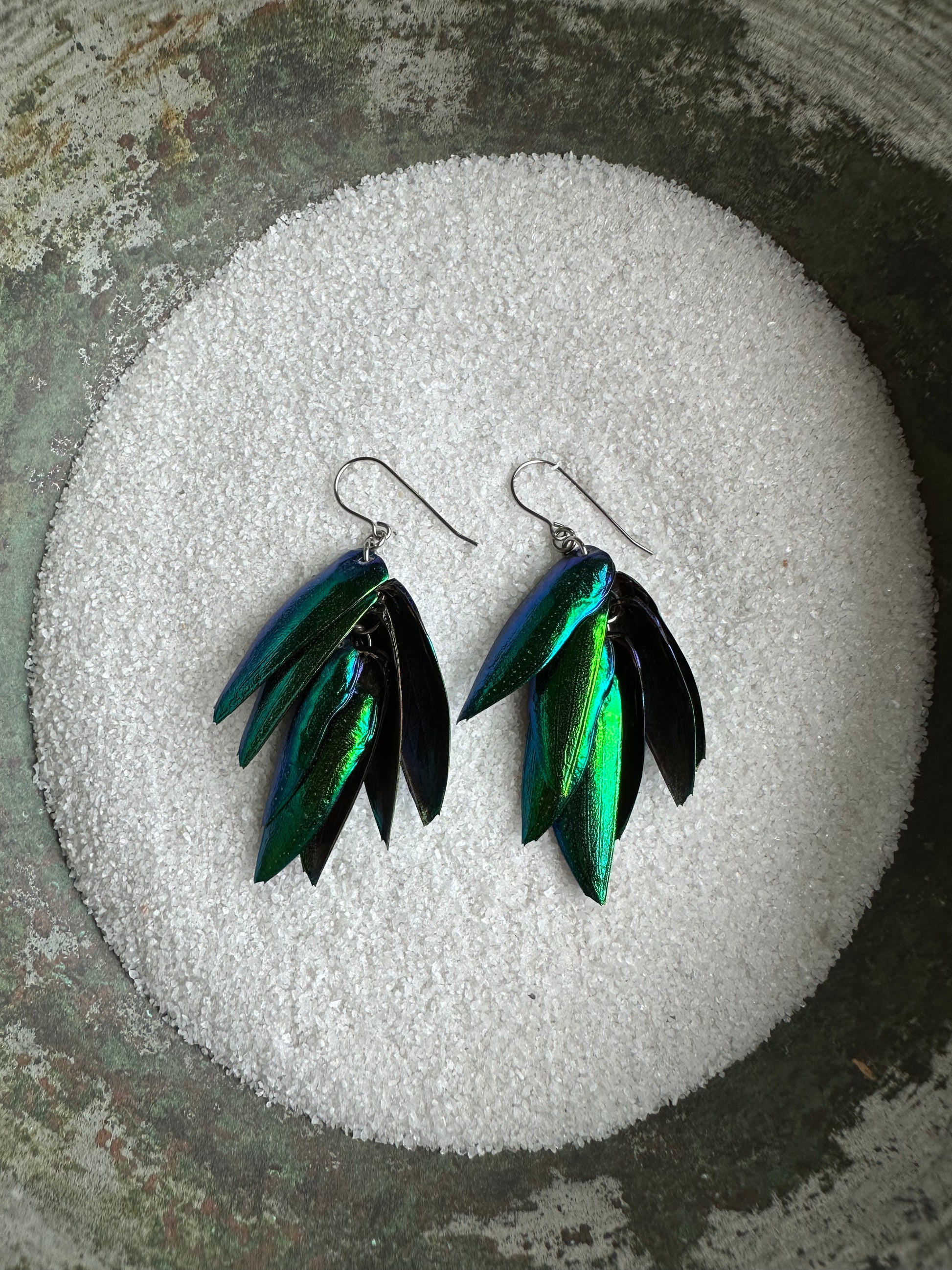 Big green earrings in a bright green chandelier design using hypoallergenic surgical steel for sensitive ears real green beetle elytra like wings lightweight waterproof timeless earring design for gift earrings made from nature