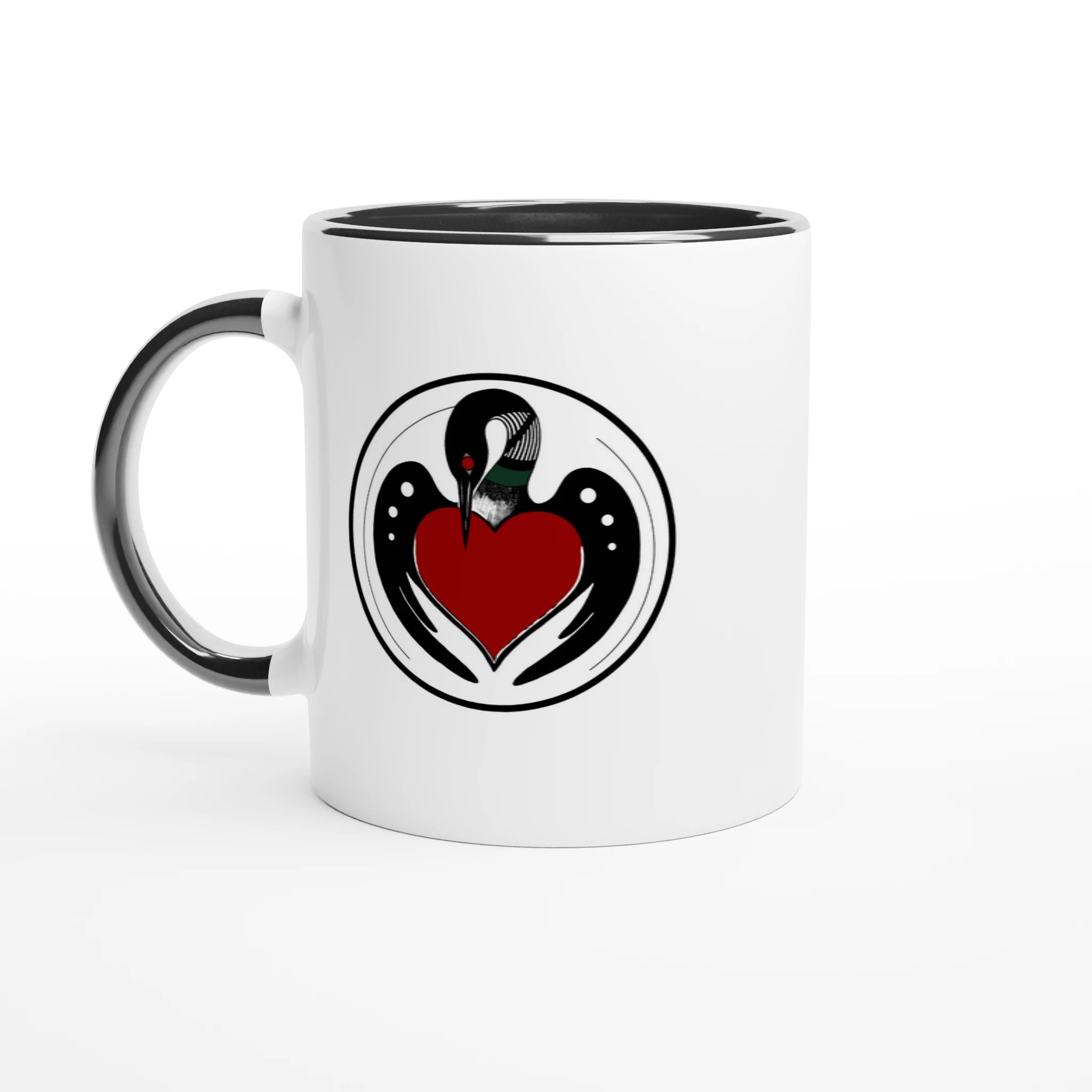 mug with Minnesota‑inspired loon illustration, glossy ceramic, and black colored rim and handle, set to the left.