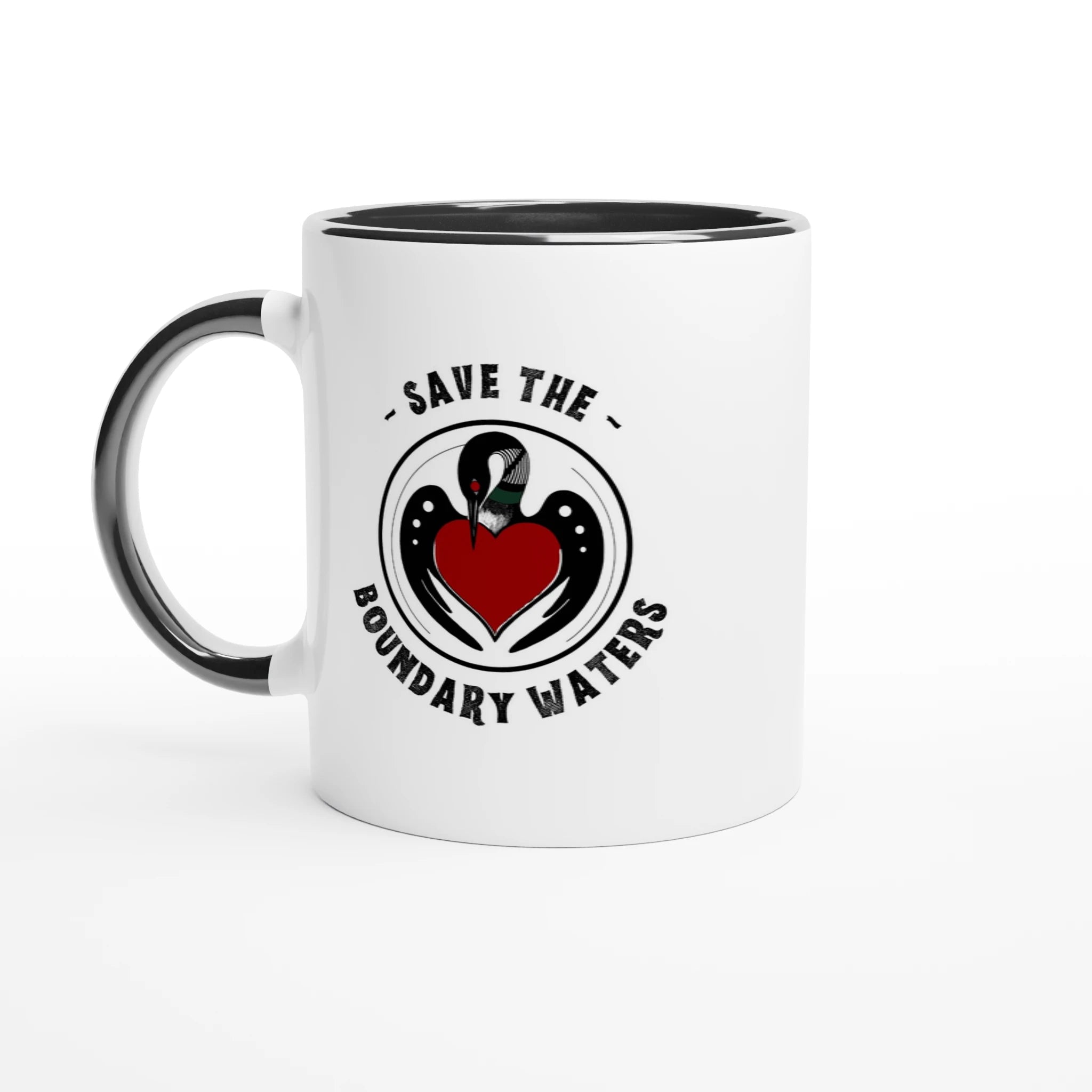 Black‑handled mug with Minnesota‑inspired loon illustration, and boundary waters text