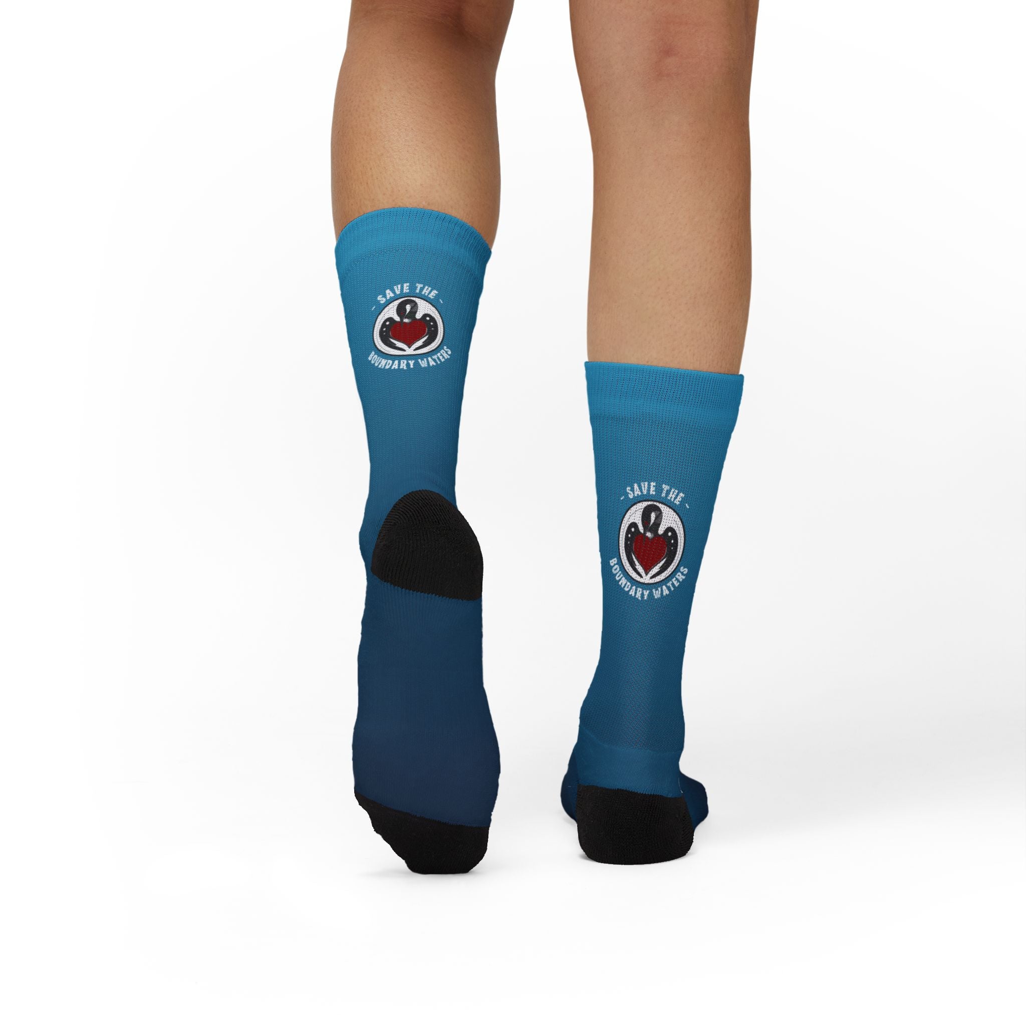 Back view showing rebel loon emblem on Minnesota state flag blue socks on walking model