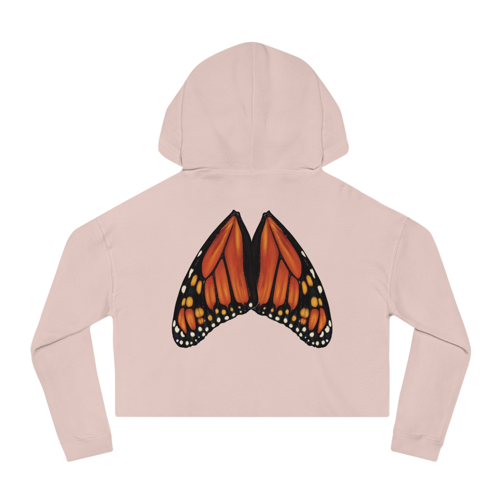 Flat lay of blush cropped hoodie showing detailed monarch butterfly wings printed naturally across the back.