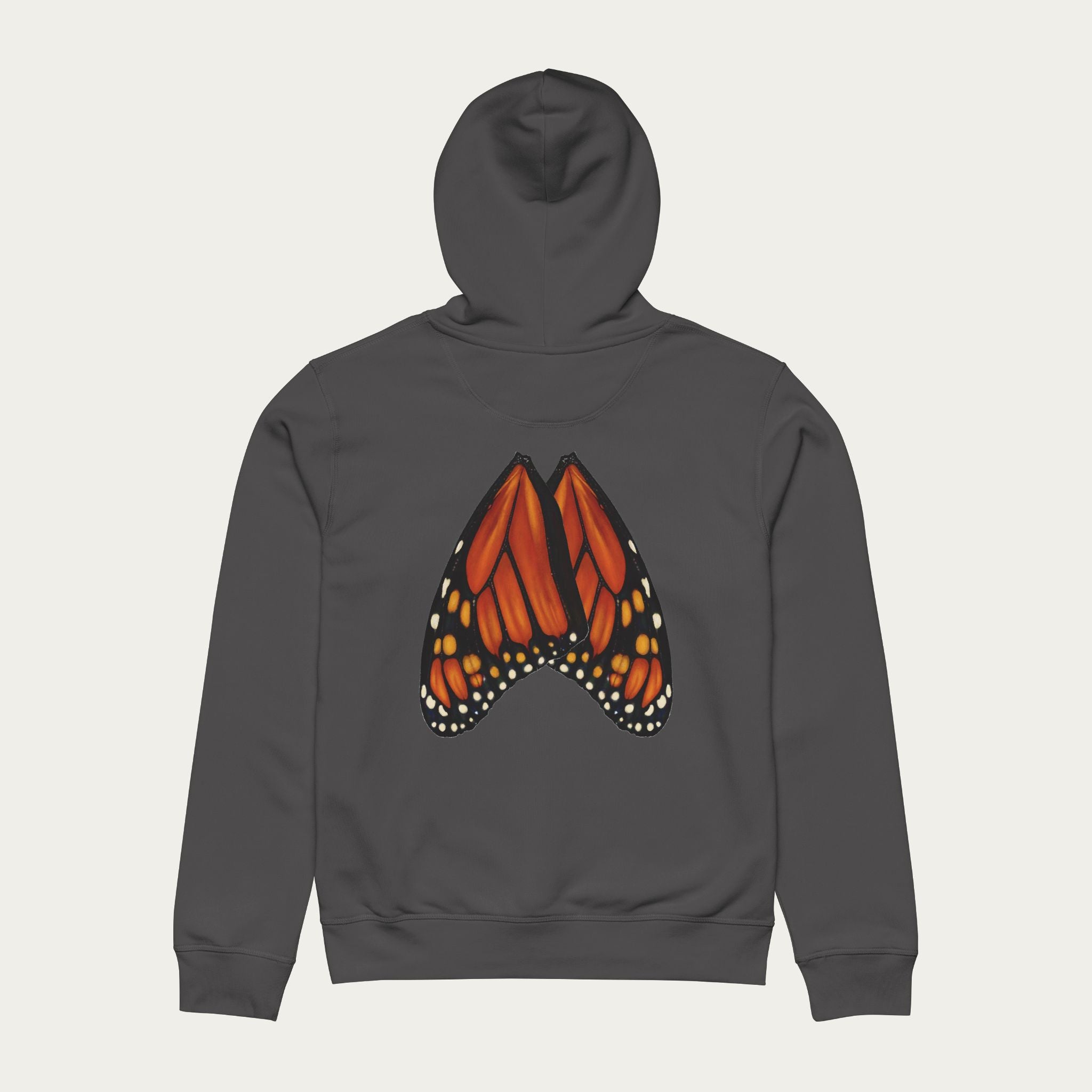 Flat lay of anthracite unisex hoodie showing monarch butterfly wings printed naturally across the back.