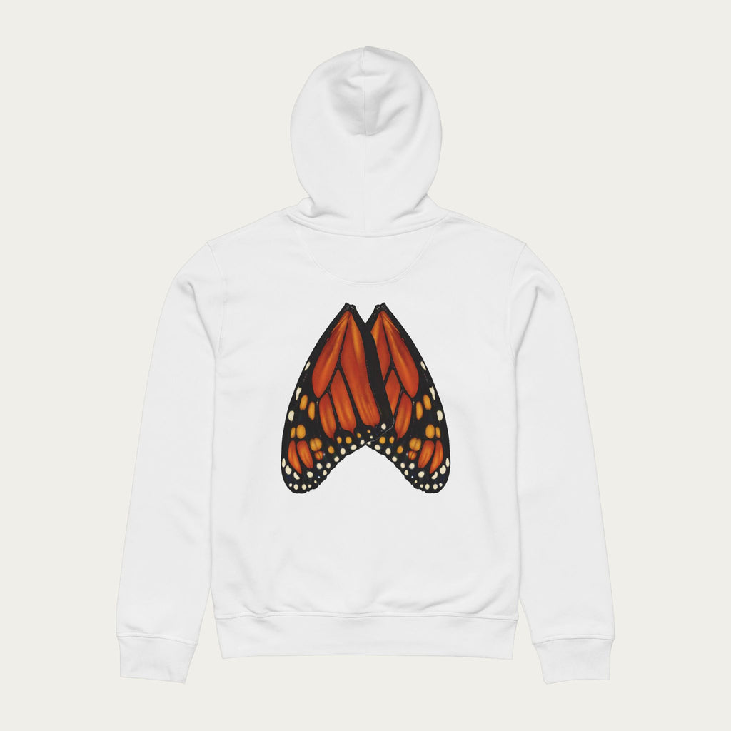 Flat lay of white unisex hoodie showing full‑scale monarch butterfly wings printed naturally across the back.