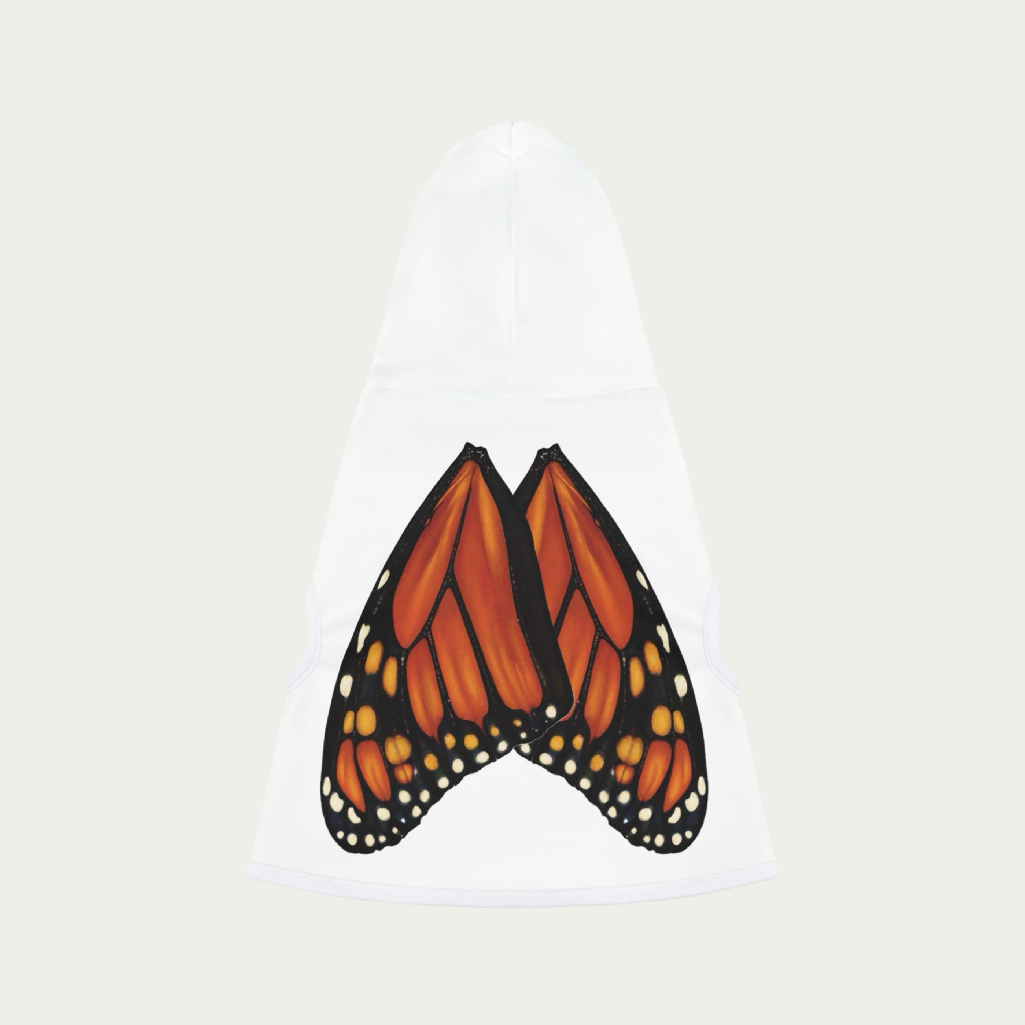 Flat lay of white pet hoodie showing the full back panel with monarch butterfly wings and attached hood.