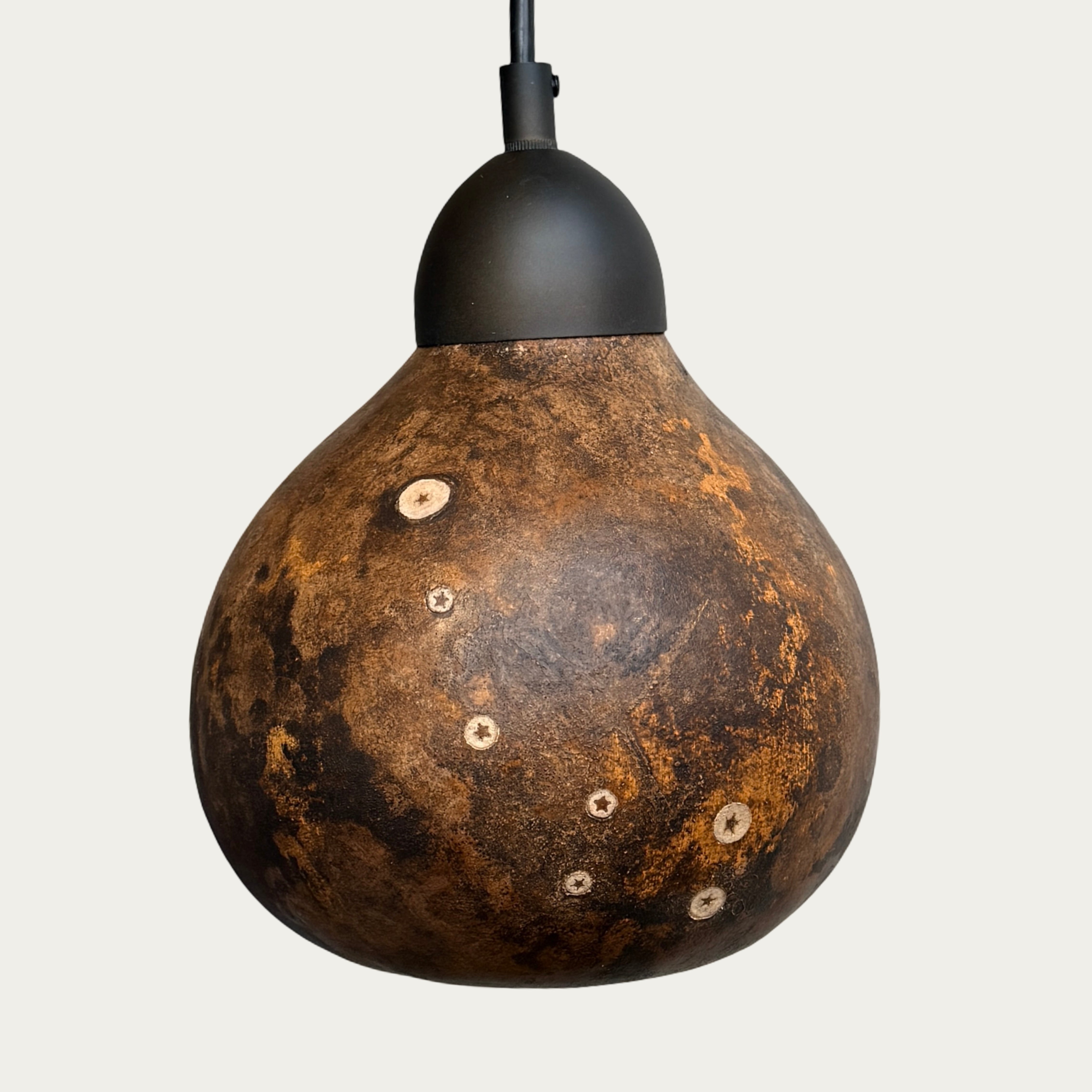 stars made by trees formed into Ursa Minor constellation by Minnesota artist, gourd pendant light embed allows wood stars to glow in dark