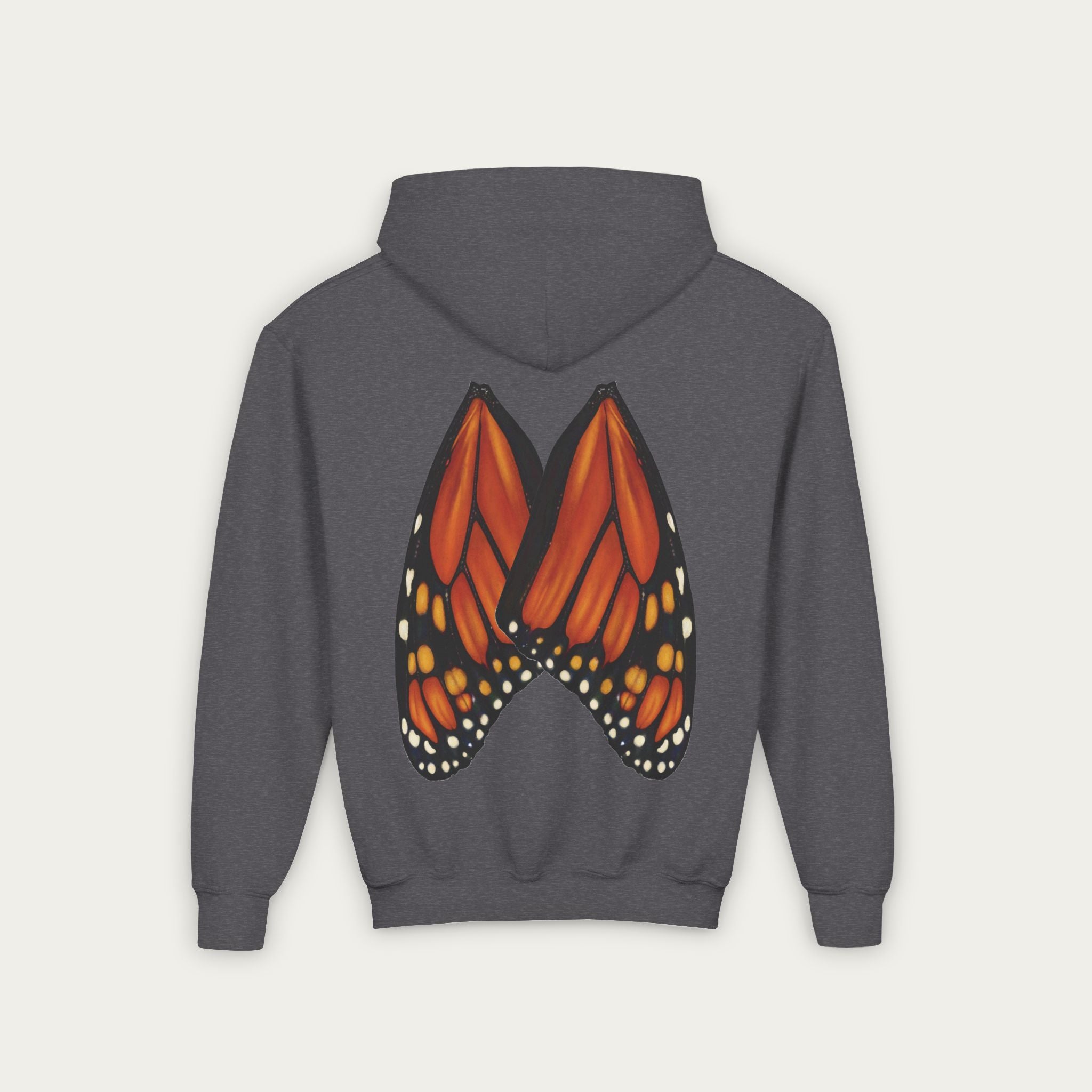 Charcoal grey kids hoodie with mn artist illustrated monarch butterfly wings on back flat lay view white background