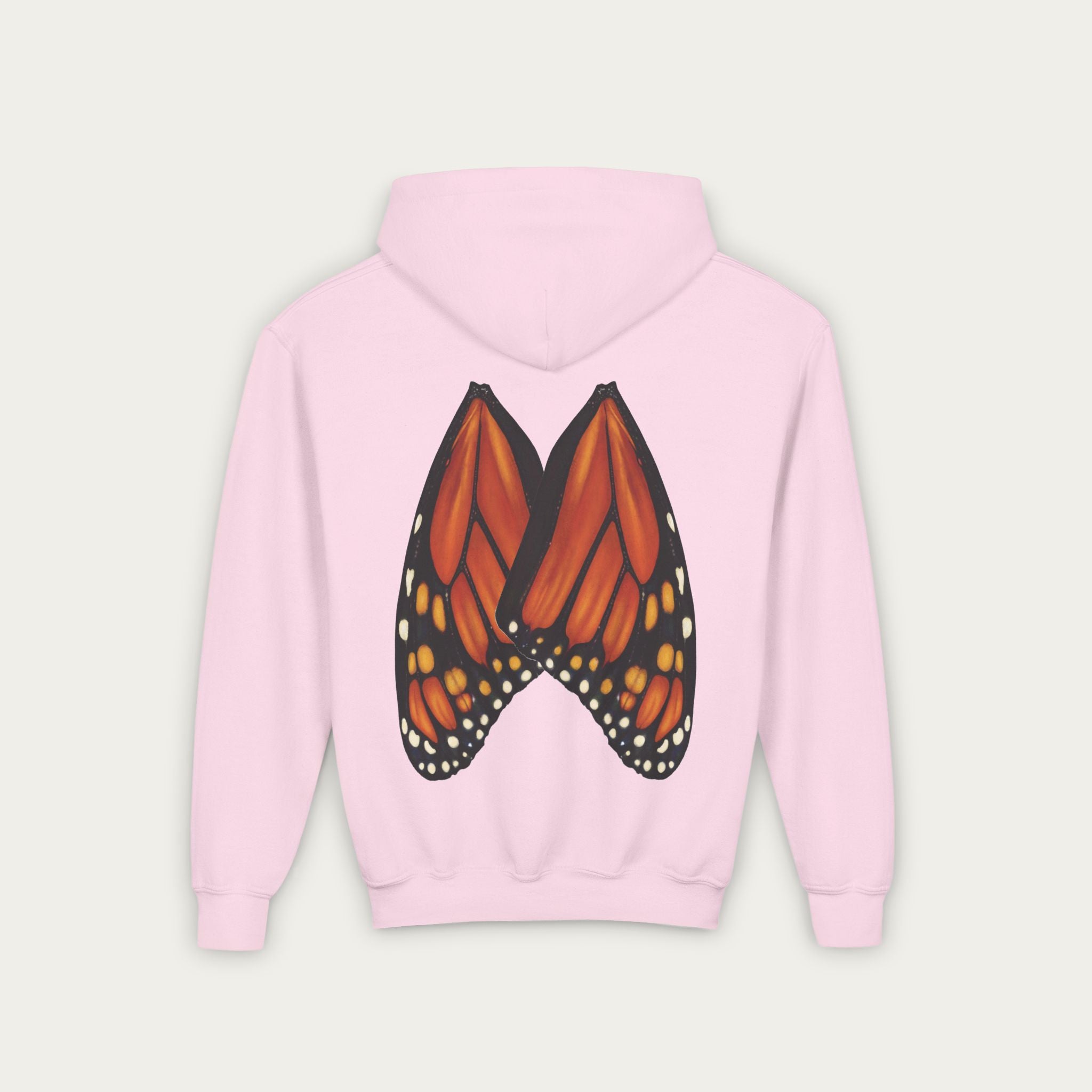 Lt pink kids hoodie with conservation artist illustrated monarch butterfly wings on back flat lay view white background