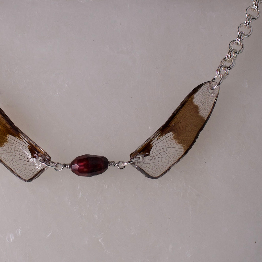 real Eight Spotted Skimmer Dragonfly wing necklace faceted pearl silver close up wax background
