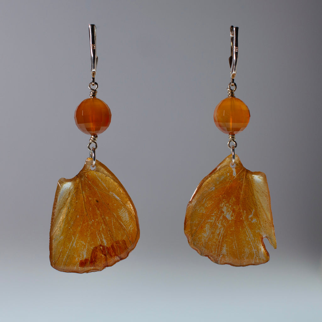 real butterfly earrings Appias nero orange butterflies silver locking earring carnelian grey background