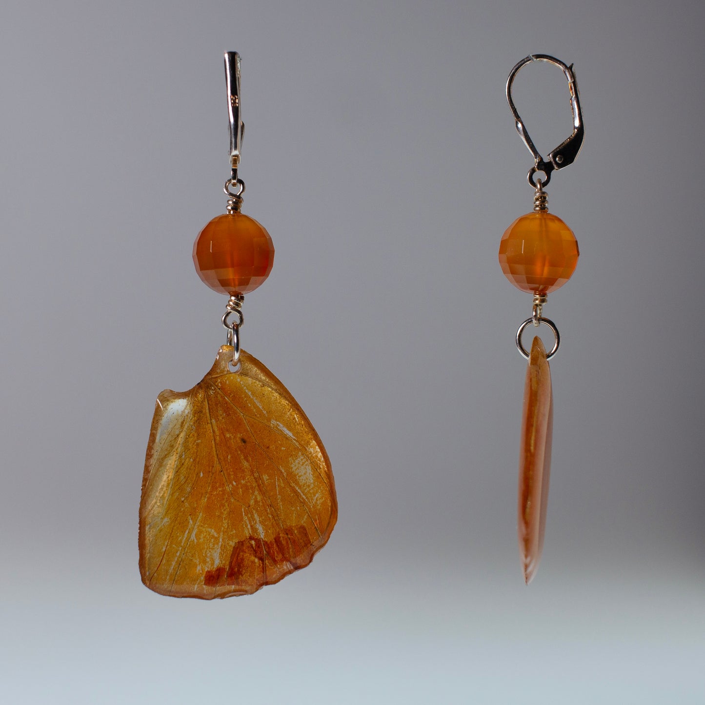 real butterfly earrings Appias nero orange butterflies silver locking earring carnelian side view