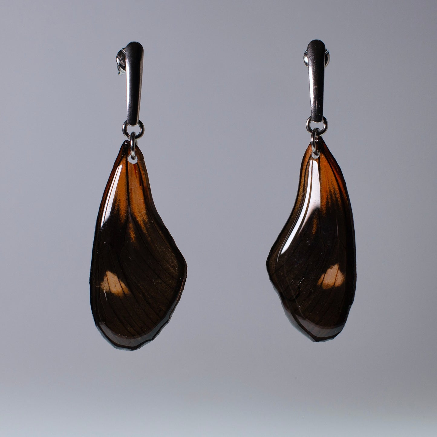 real butterfly earrings red black butterflies hypoallergenic surgical steel long studs grey background