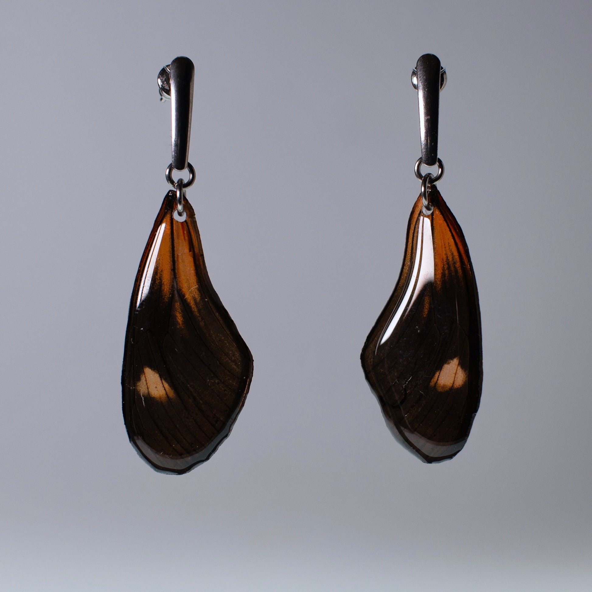 real butterfly earrings red black butterflies hypoallergenic surgical steel long studs grey background