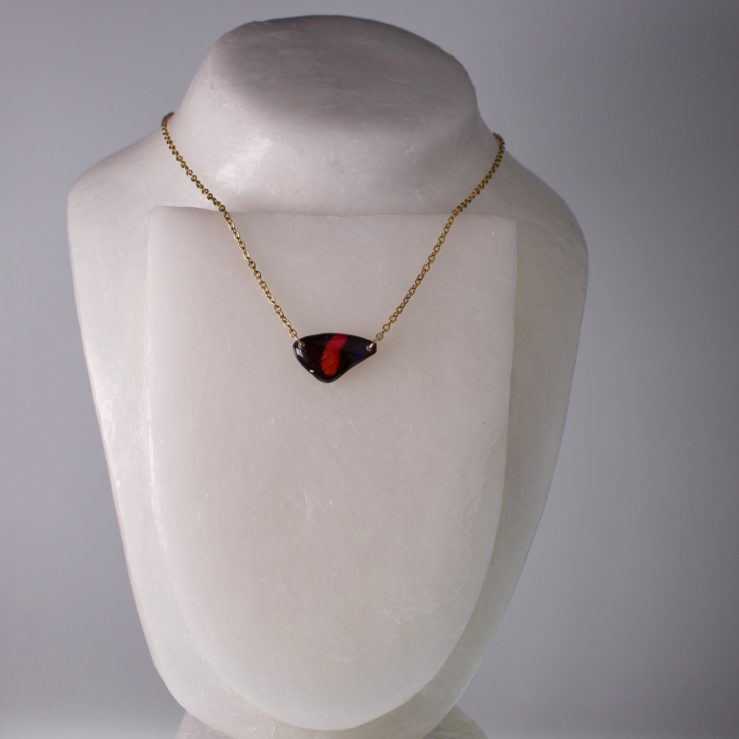 real butterfly necklace red black butterflies gold chain on wax neck form