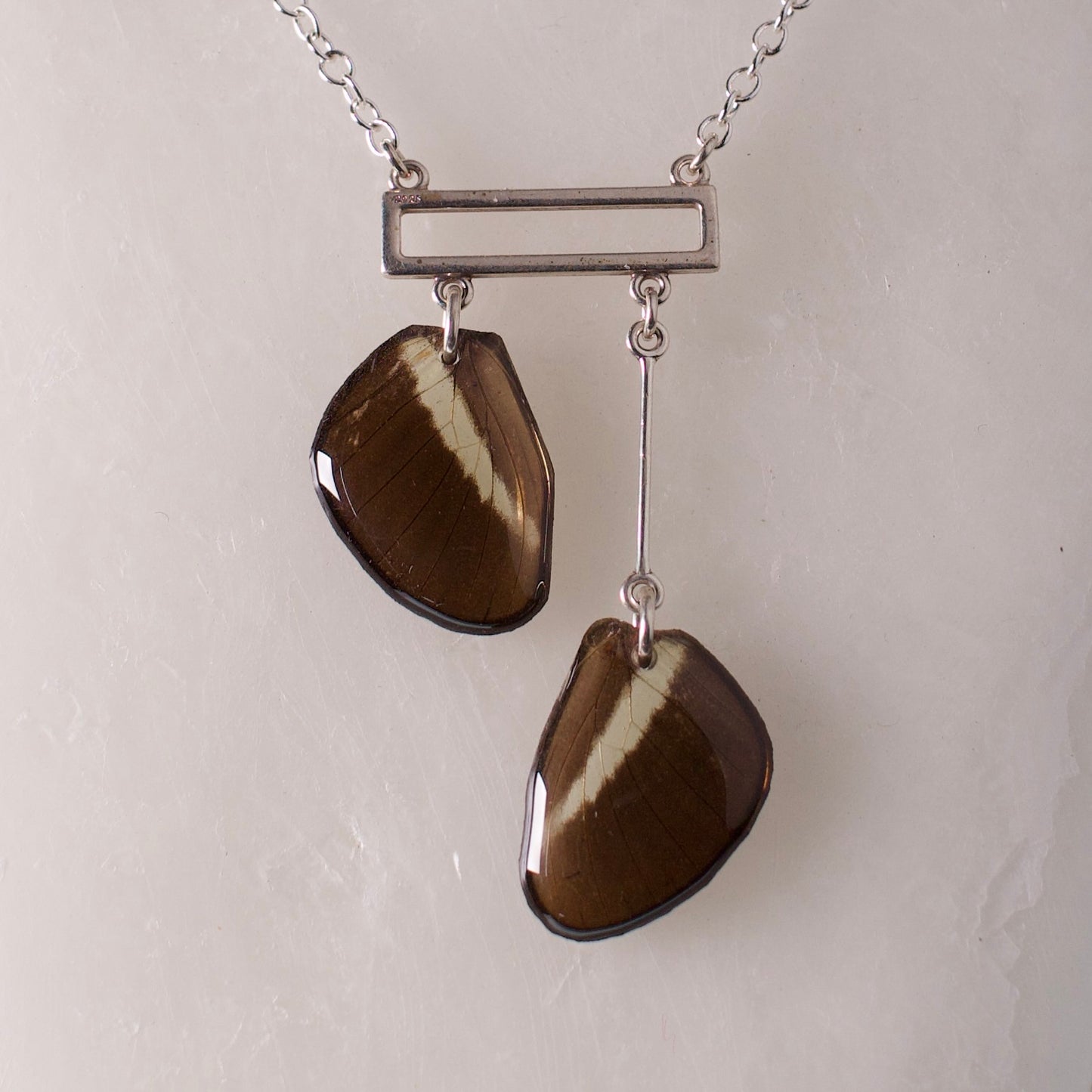 real butterfly necklace silver rectangle Heliconius butterflies sterling silver close up