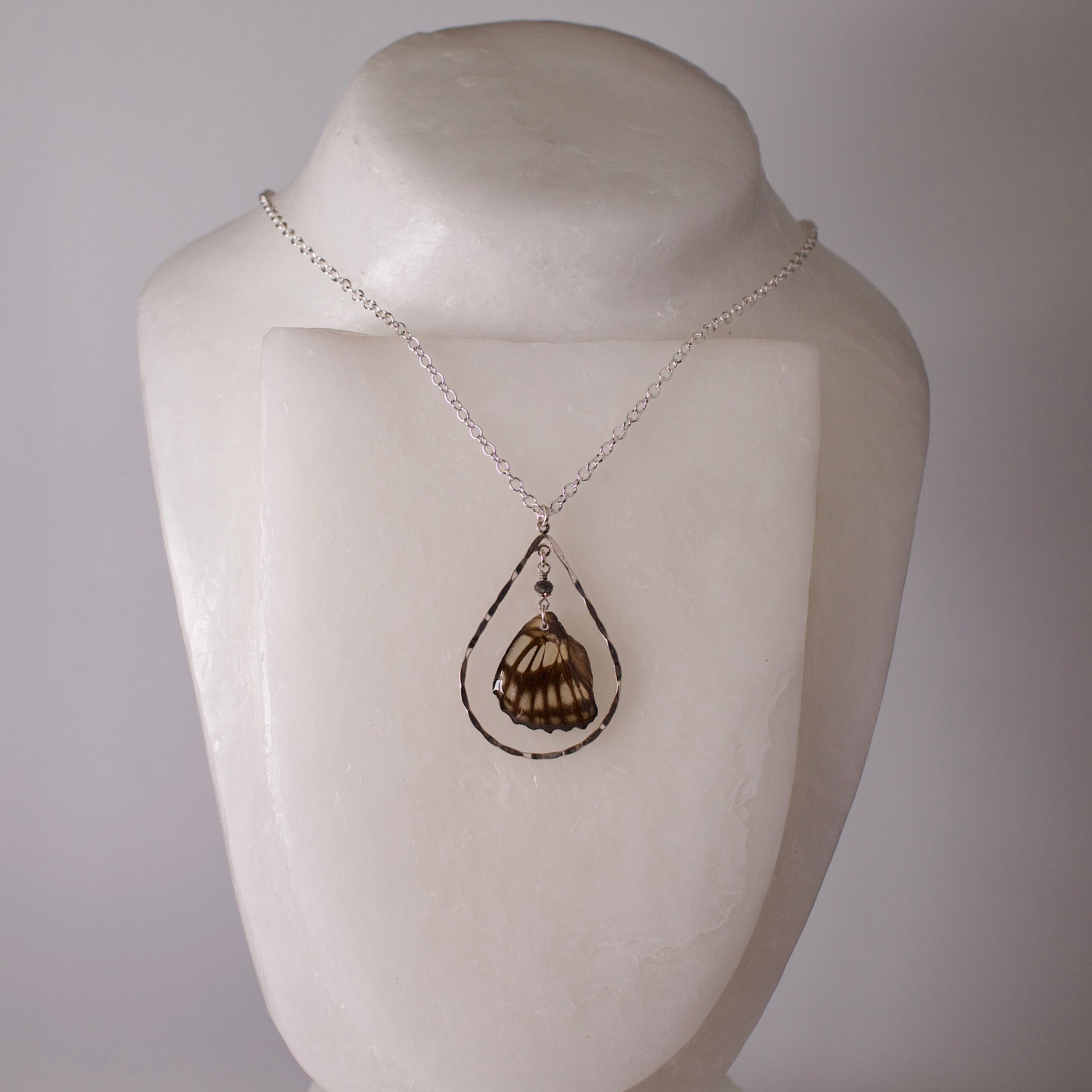 real butterfly pendant spotted striped butterflies hematite sterling silver teardrop silver necklace on form