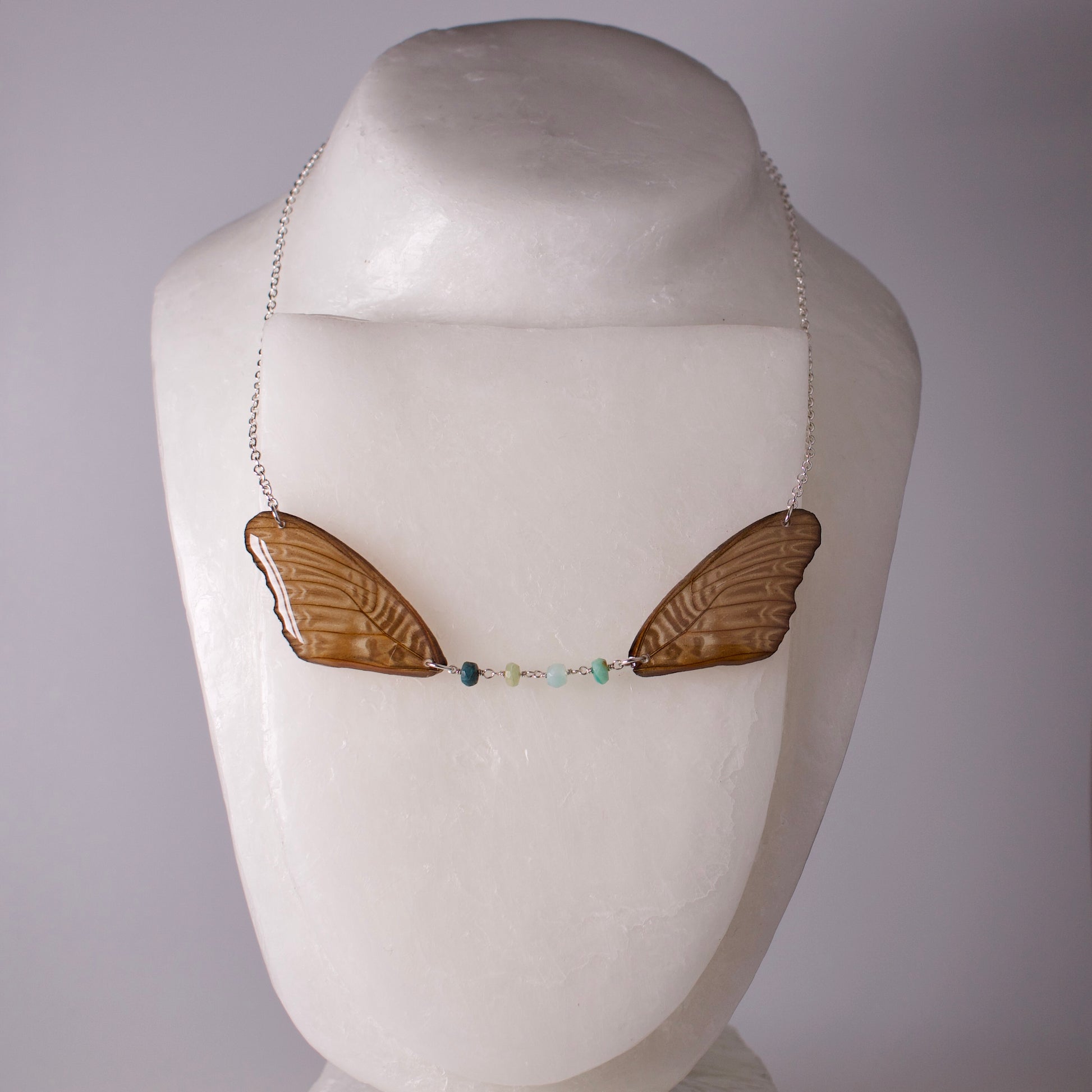 real butterfly wing necklace Violet lacewing Cethosia myrina Peruvian blue opal silver chain on mannequin