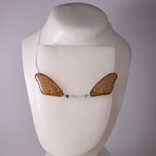 real butterfly wing necklace Violet lacewing Cethosia myrina Peruvian blue opal silver chain on mannequin