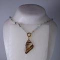 real butterfly wing necklace blue beaded gold front clasp on wax form