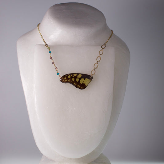 real butterfly wing necklace electric green swordtail butterflies gold asymmetric multi-color beads on mannequin
