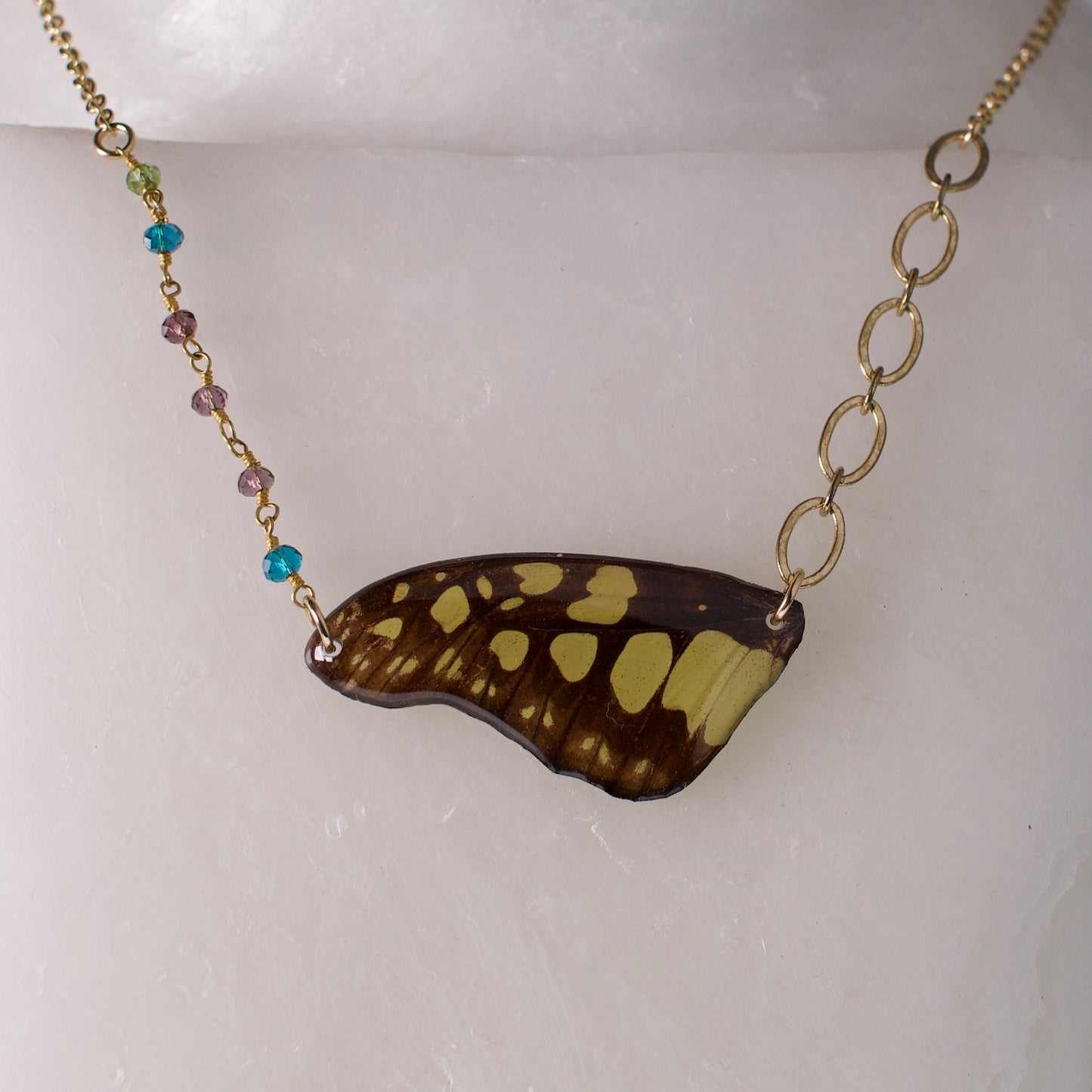 real butterfly wing necklace electric green swordtail butterflies gold multi-color beads close up