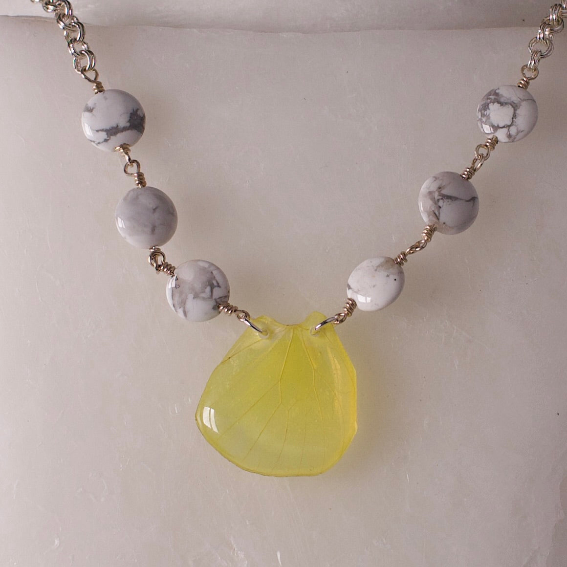 real butterfly wing pendant fluorescent yellow butterflies white howlite silver double link chain necklace close up