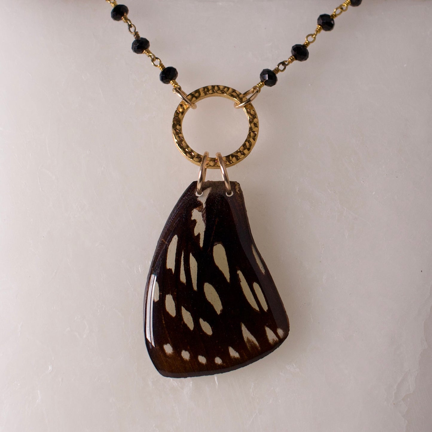 real butterfly wing pendant gold black onyx forest queen butterflies close up on wax