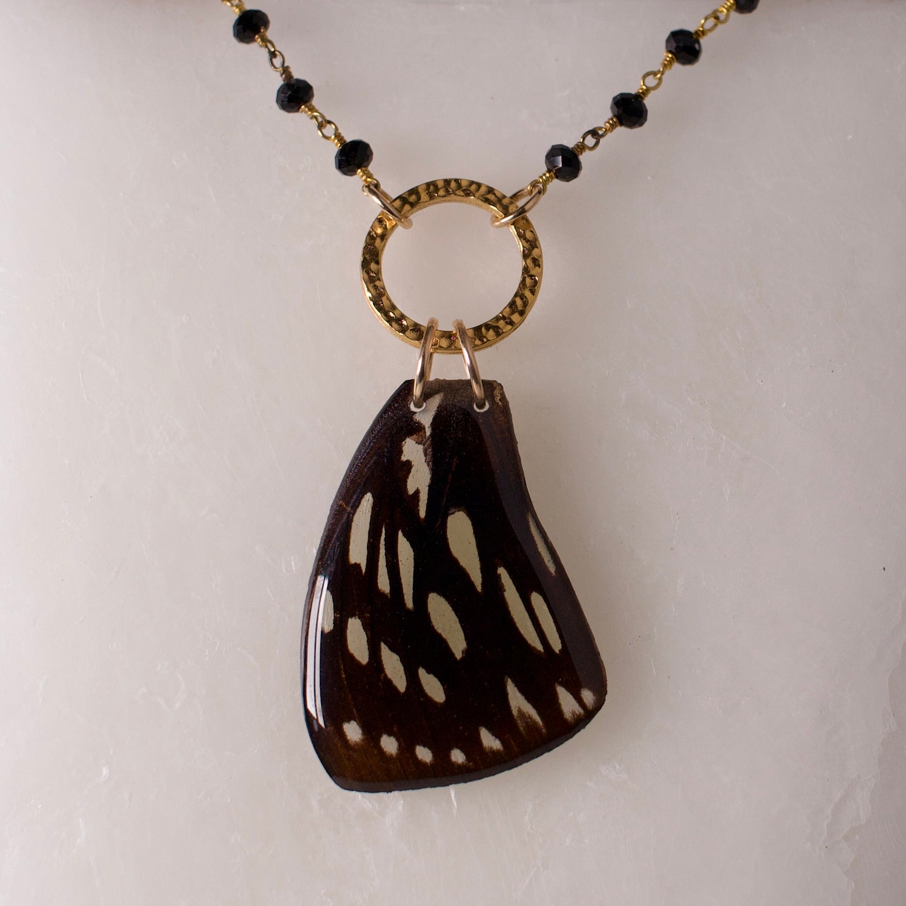 real butterfly wing pendant gold black onyx forest queen butterflies close up on wax