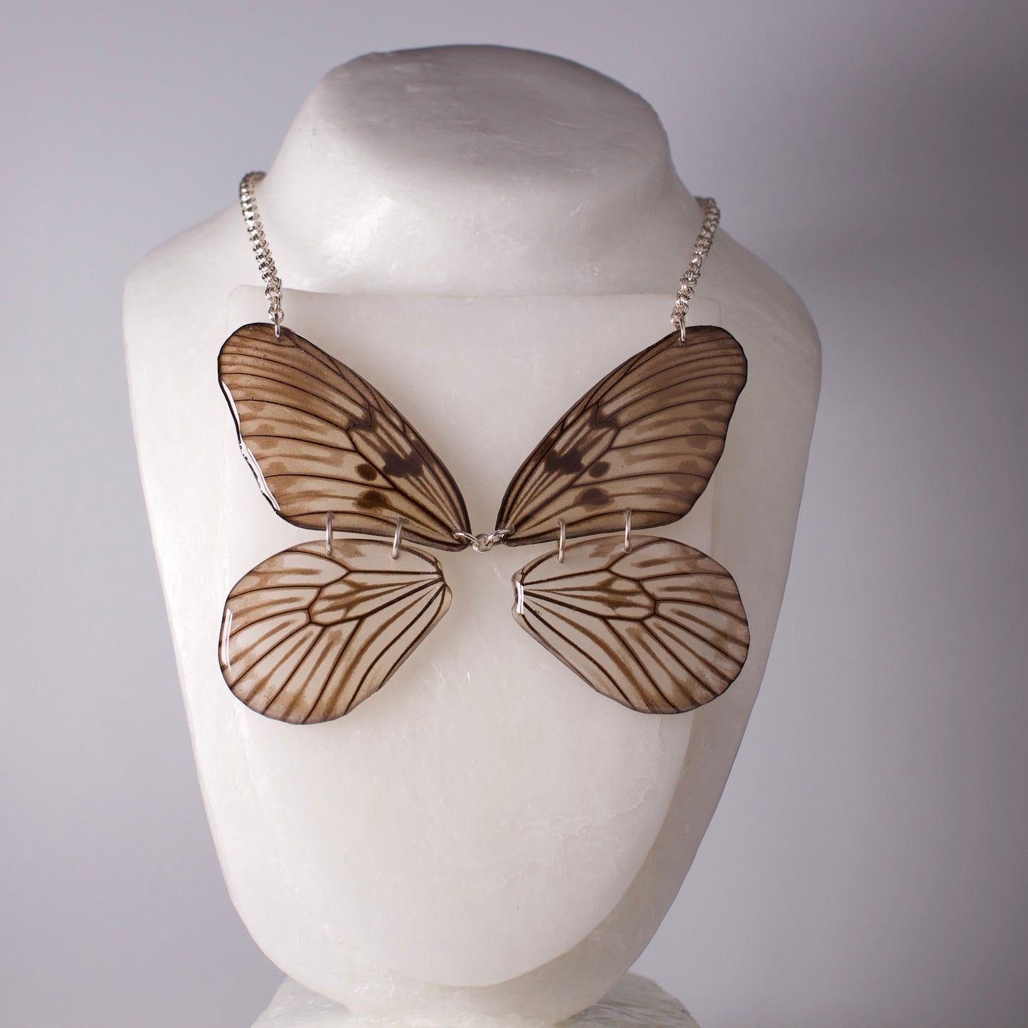 real butterfly wing statement necklace  Blanchardii"s Ghost Butterflies silver chain on mannequin