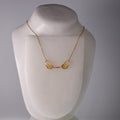 real cicada wing necklace Magicicada cassini Kansas Brood Cicadas fire agate gold chain on mannequin