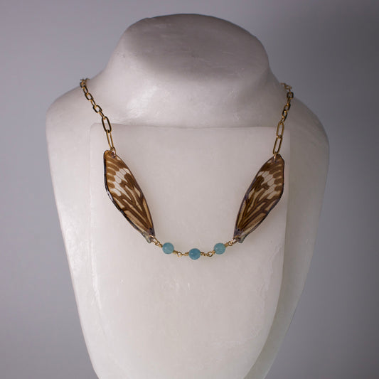 real ethically sourced cicada wing necklace gold chain apatite stones on mannequin