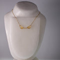 real cicada wing necklace sapphire tiny gold cicadas gold chain on mannequin