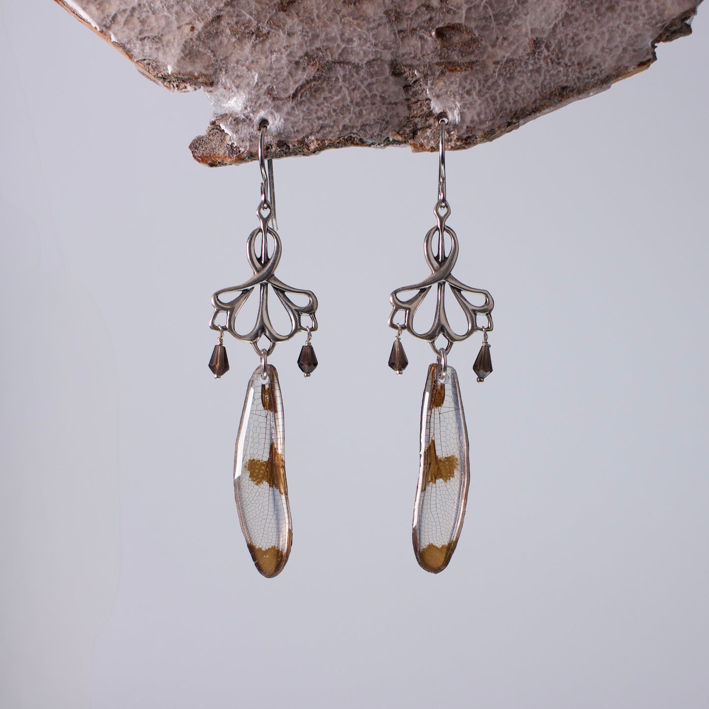 real dragonfly wing earrings twelve spotted skimmer dragonflies smokey quartz sterling silver earring on wood stand