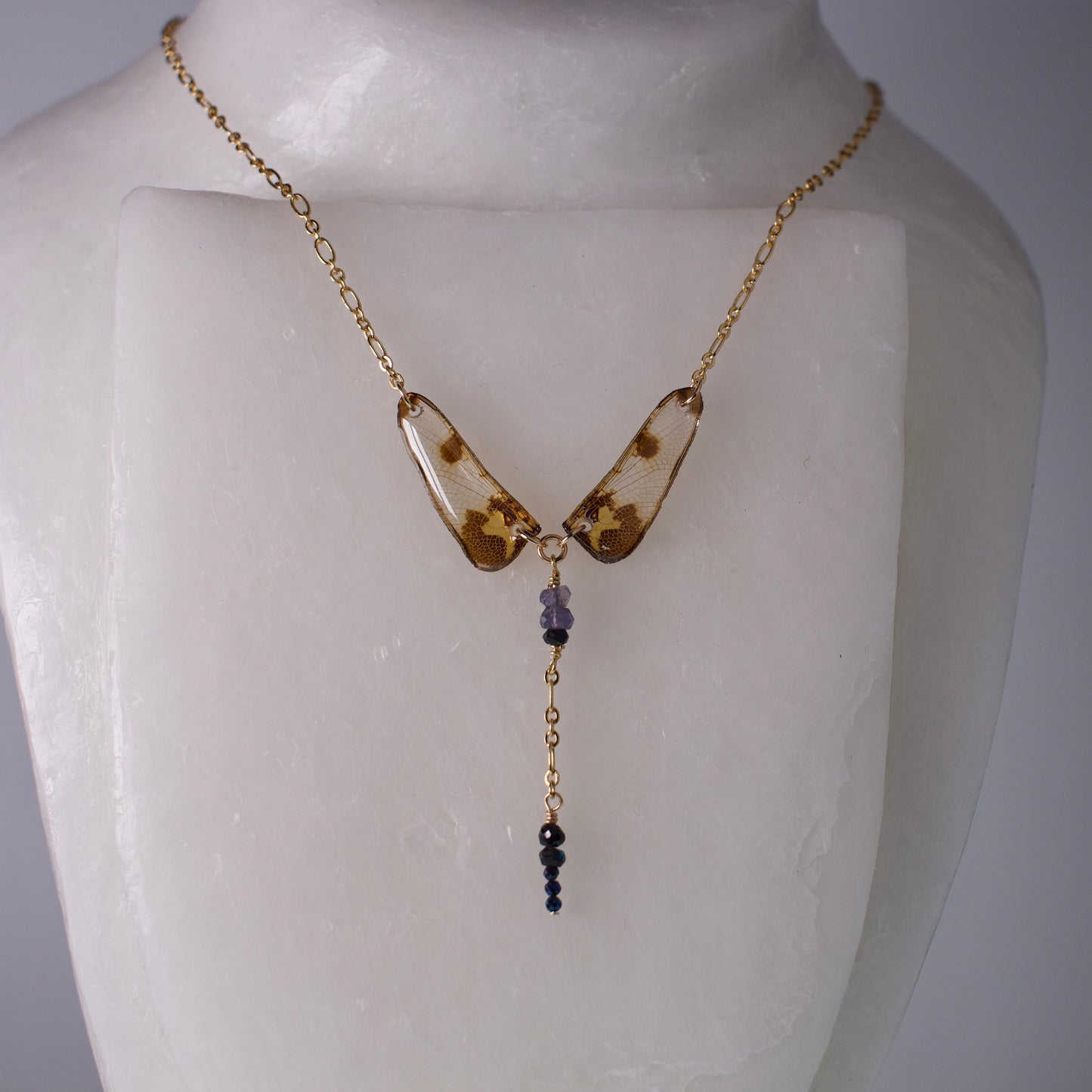 real dragonfly wing necklace blue black gold chain on wax form