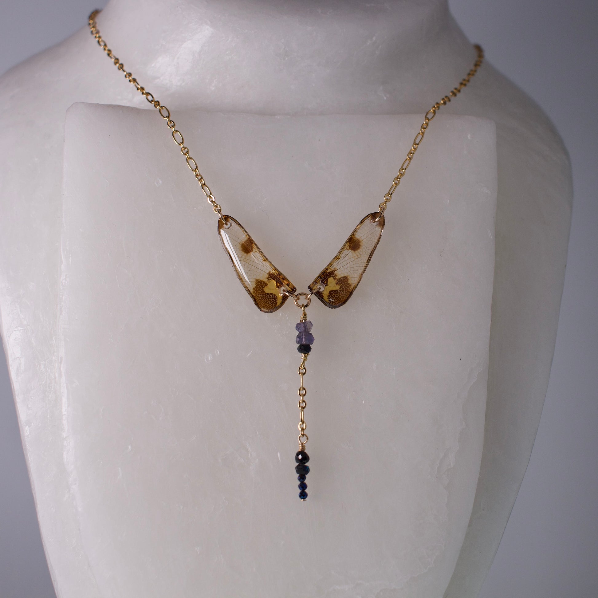 real dragonfly wing necklace blue black gold chain on wax form