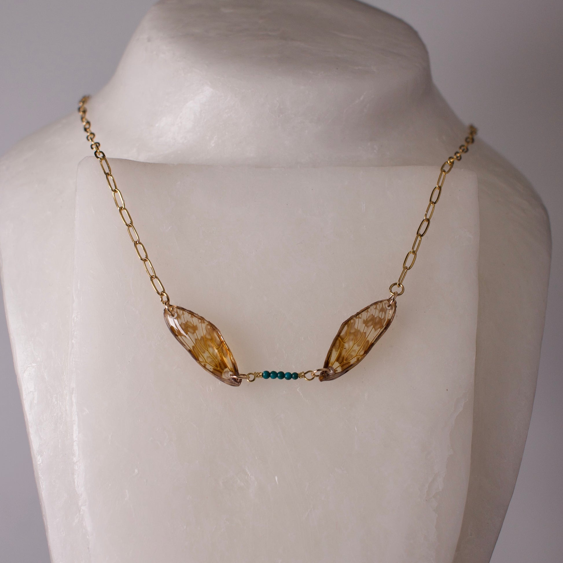 real leaf hopper necklace Northwestern Leafhopper green turquoise gold necklace on form