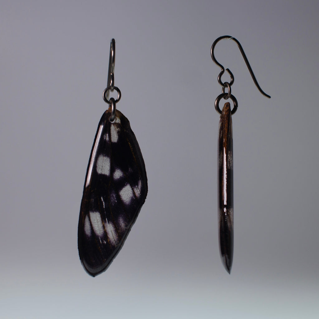 real moth wing earrings tiger moths black niobium French hook earring side view