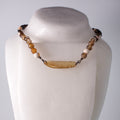 real praying mantis wing pendant sterling silver agate strand necklace on mannequin